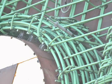 An arch epoxy coated bar structure used for bridge.
