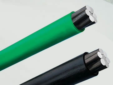 Two pieces of unbonded PC strand: one is covered by green HDPE, the other is covered by black HDPE.