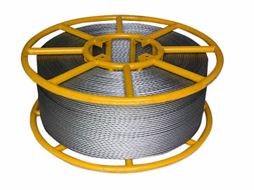 A large yellow steel spool of galvanized steel strand.