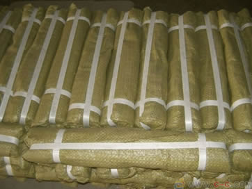 Many bags of steel bars in woven bag.